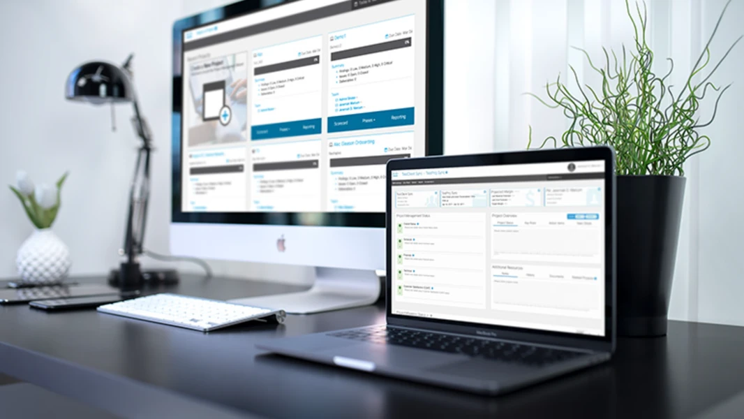 The redesigned Cisco consulting delivery tool on a desktop and a laptop